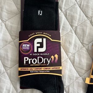 Brand new Foot Joy Pro Dry black crew sock.  One size.  Moisture Wicking